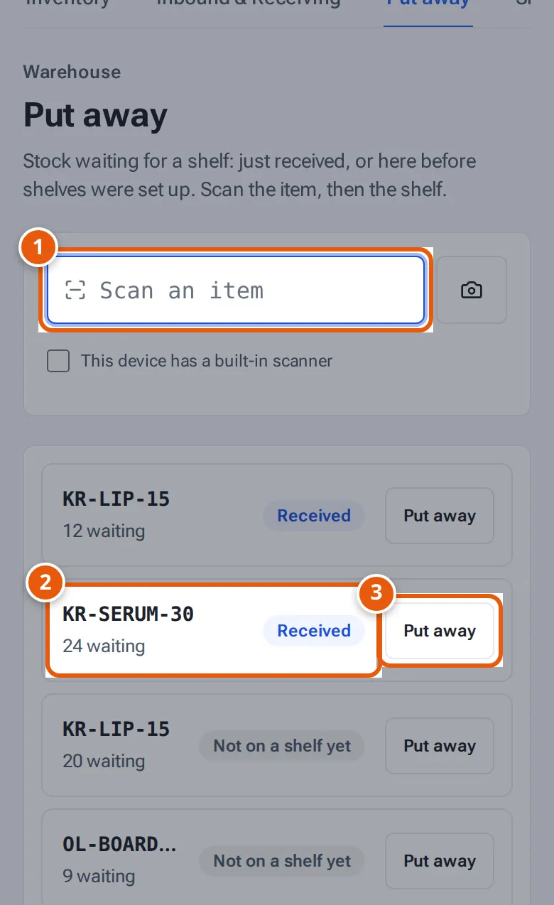 Put away on a phone: the scan box and stock waiting for a shelf with Put away